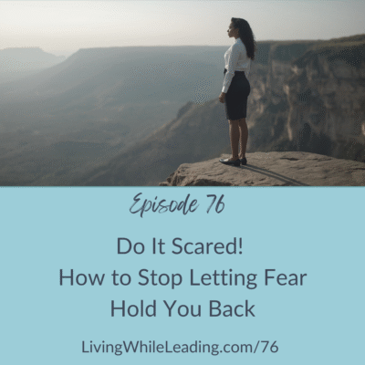 The image features an Afro-Latina woman,dressed in a white blouse, black skirt and flat shoes standing on the edge of a cliff. She is not facing the camera and is looking outward at the sky and mountain range ahead of her. The text reads: Episode 76, Do it Scared! How to Stop Letting Fear Hold You Back, LivingWhileLeading.com/76